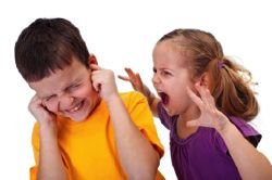 Photo of children yelling at each other.