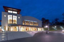 Exterior photo of kasser theater at dusk