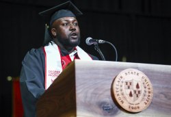 Chris Taite, an inaugural graduate of the Bachelor of Arts in Liberal Studies online degree completion program, delivers his student speech at the May 2023 Commencement ceremony.