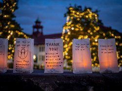Lit luminaria at the University's COVID Remembrance event
