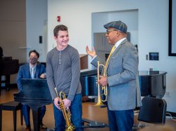Wynton Marsalis speaking with Will Schetelich, freshman Jazz Studies trumpet major