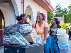 two students moving in