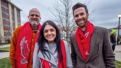 Montclair staff wearing montclair state university branded scarves