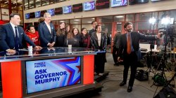 Governor Murphy, students and faculty hold a pose while President Koppell sets up for a selfie