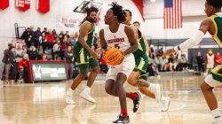 Photo of Montclair State basketball player on court