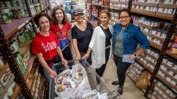 Montclair State University employees with a shopping cart