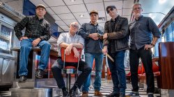 Five faculty members arrayed in the Red Hawk Diner