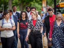 A group of people walk together.