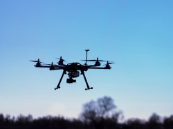 Drone flying through the sky.