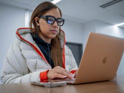 Student using their laptop.