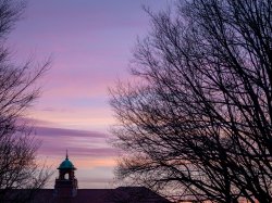 photo of Cole Hall tower at sunset