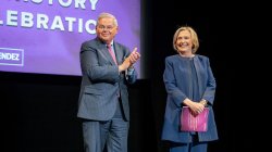 Senator Menendez and Secretary Clinton on stage