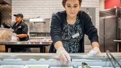 Sheridan Wheeler takes the temperature of salad bar tomatoes.