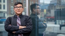 Jose Carlos Aguilar outside the Paterson Division of Child Protection and Permanency, where he interned, helping children find safe homes or reunite with family.