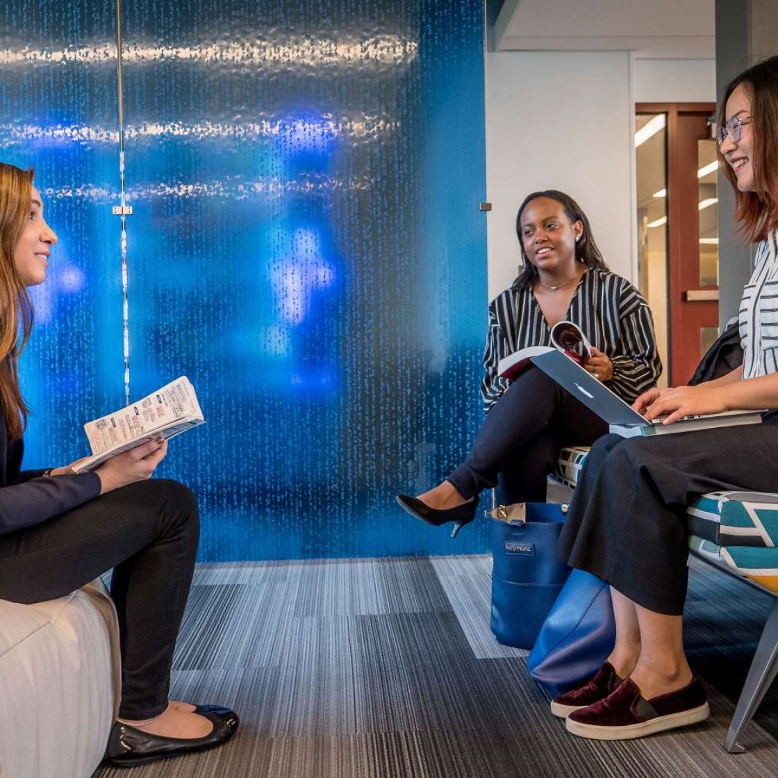 Three students in a lounge