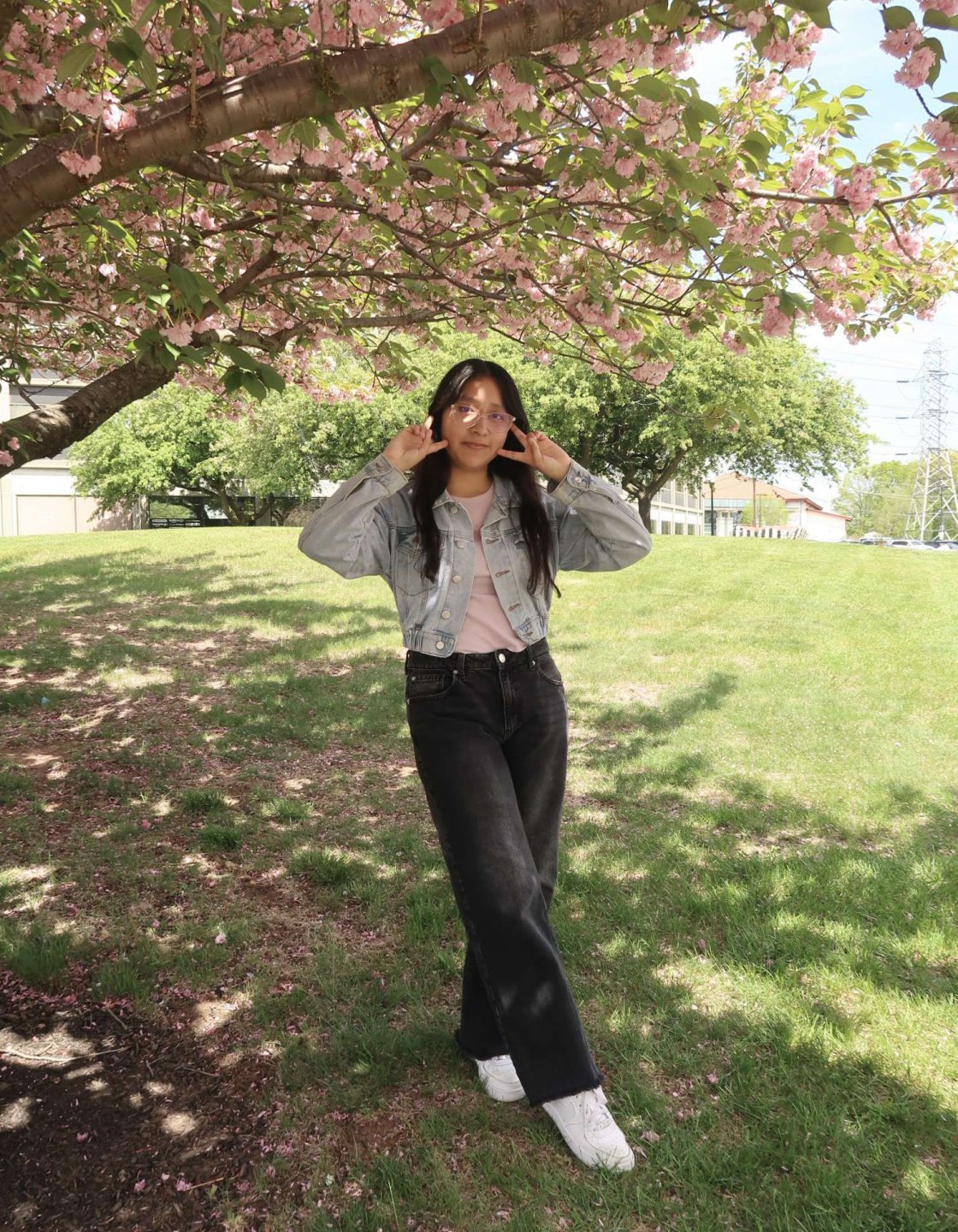 Pamela Hernandez poses under a tree on Montclair campus.