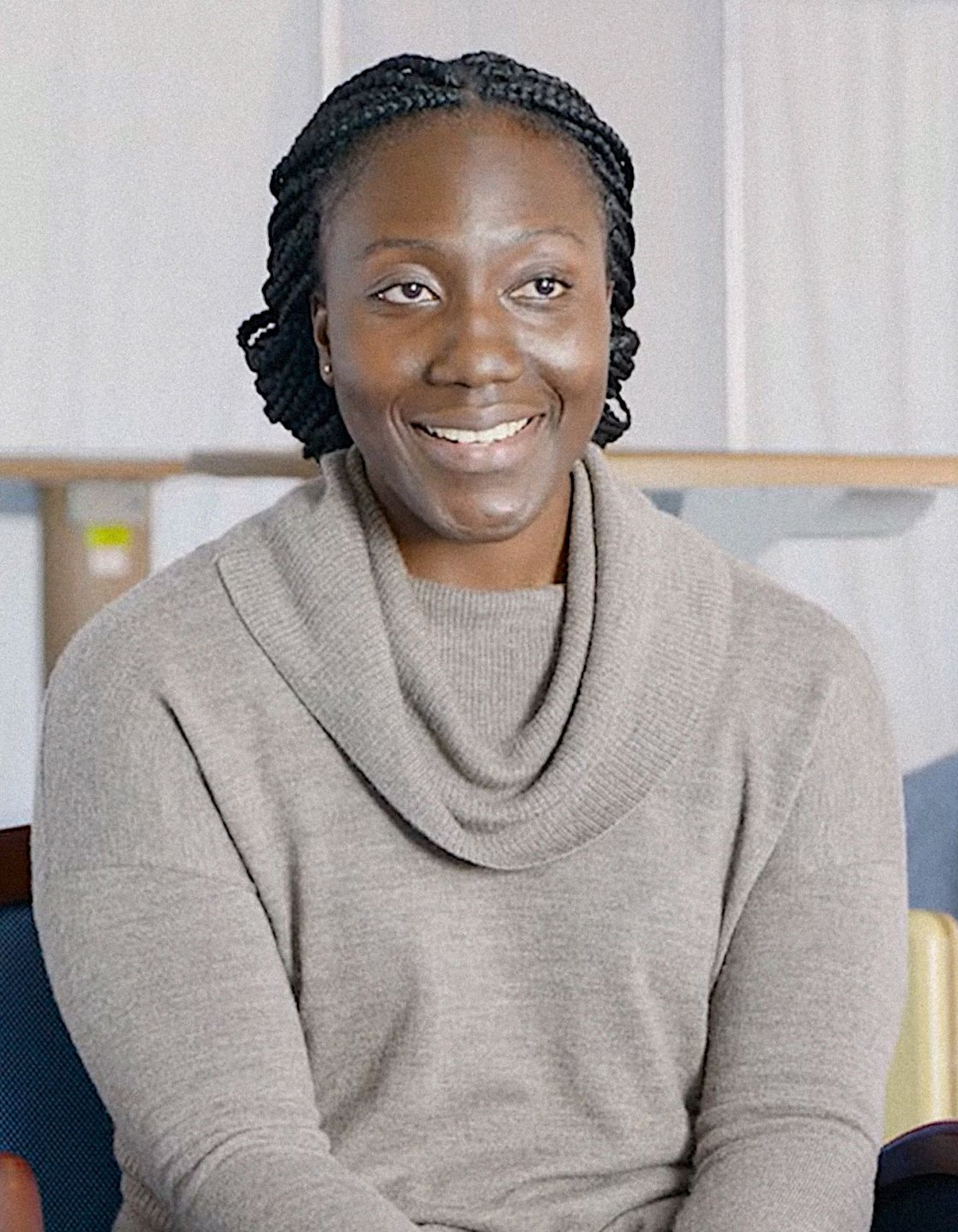 Elsie Alabi-Gonzalez smiling at the camera
