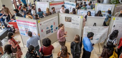 CSAM research days, posters and students fill the room.