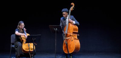 Cellist and bassist perform a duet onstage
