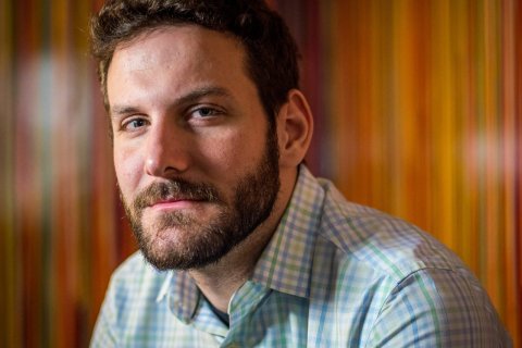 Headshot of Joel Penney looking at the camera