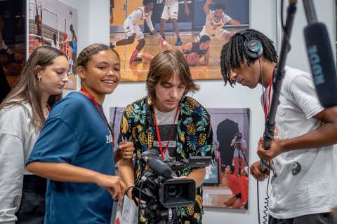 High school students use advanced cameras as part of the Sports Communication program during Pre-College Summer.