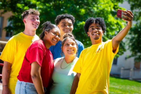 Students on main quad taking a selfie