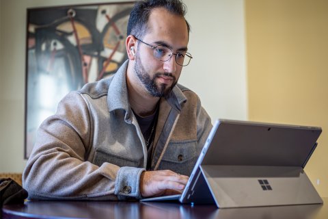 college student at computer