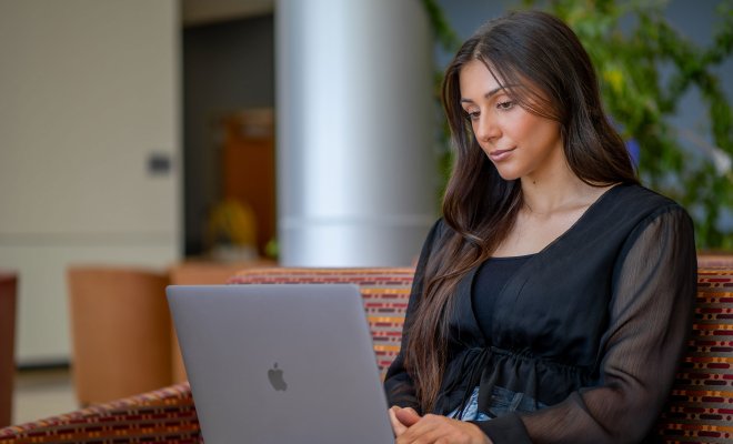 Student working on laptop