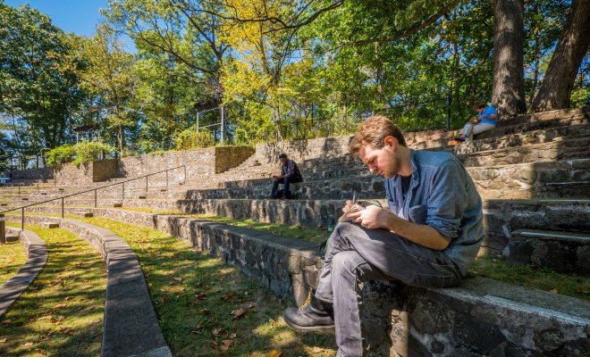 Students sit and study in the Amphitheater.
