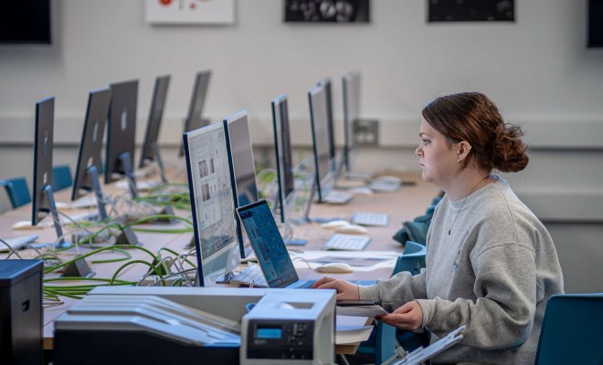 Student in the design computer lab.