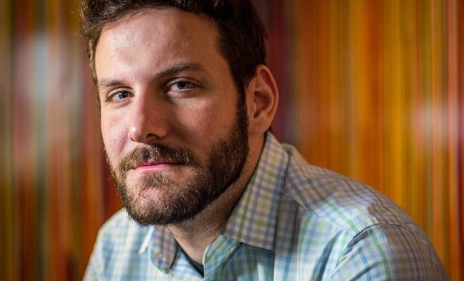 Headshot of Joel Penney looking at the camera