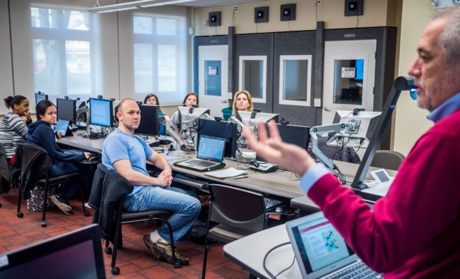 Students in classroom looking at instructor.