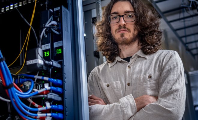 Montclair undergraduate student and Goldwater Scholarship winner, Joseph David Quinn-Vitabile at the Montclair University Data Center.