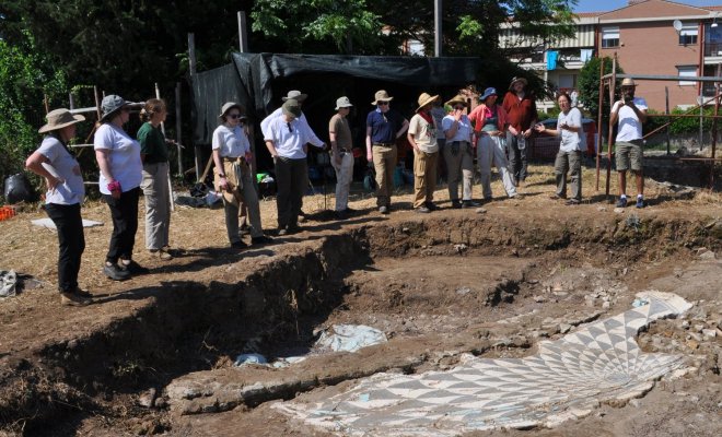 Restorer Roberto Civetta and Professor Chatr Aryamontri show a mosaic found at the Villa of the Antonines to Field School students.