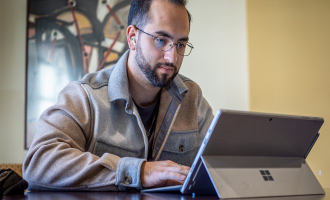 college student at computer