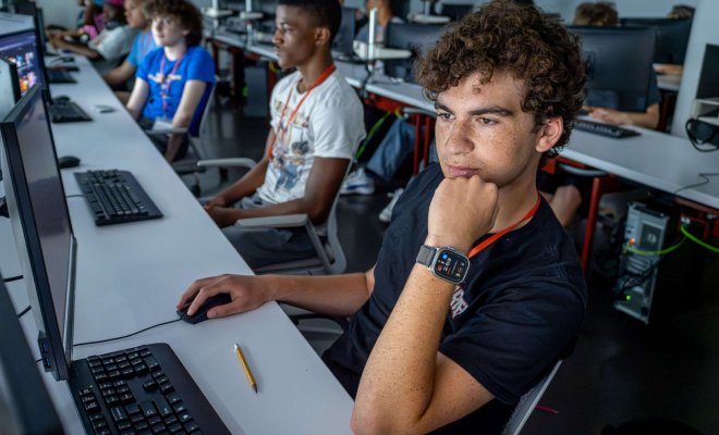 A student works at a computer on the campus of Montclair State University.