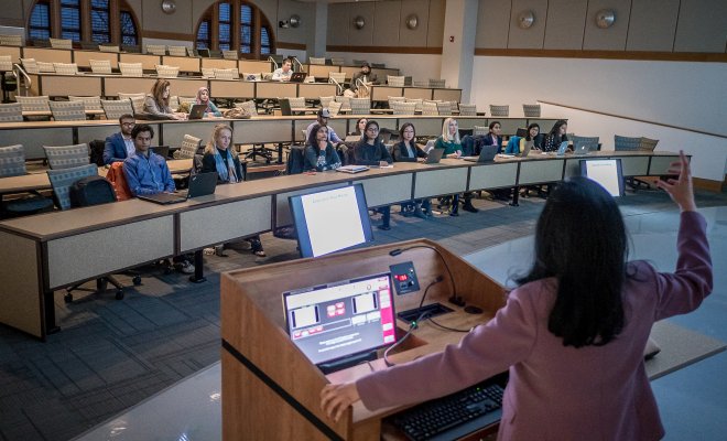 Computer Science professor giving a lecture to their students.