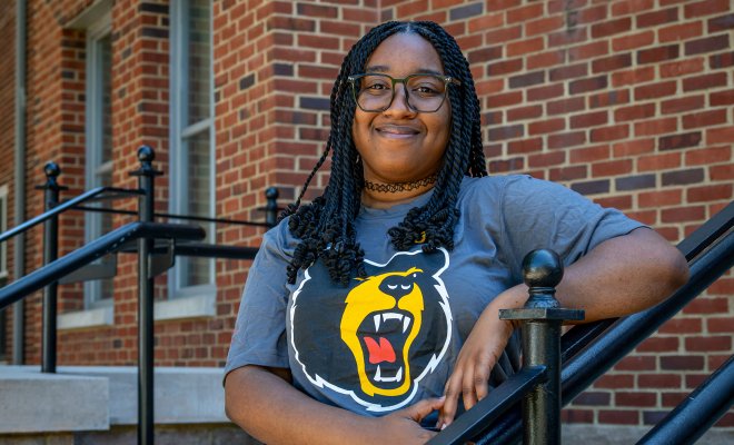 Student Kimora Mote posing on outside staircase at Bloomfield College