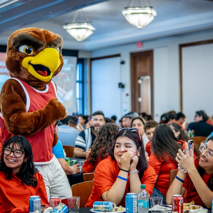 Students at HSCI Orientation with Rocky in the crowd.