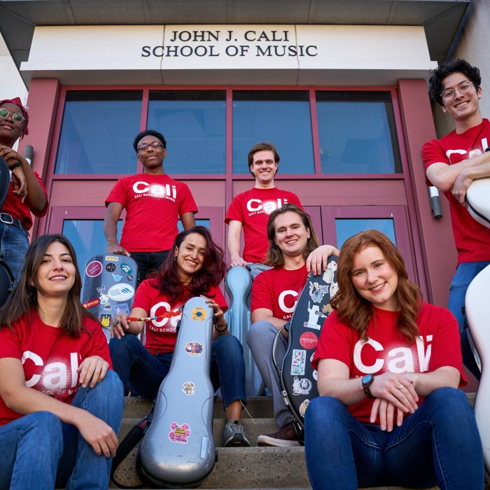 Cali Collective in front of the Cali School of Music