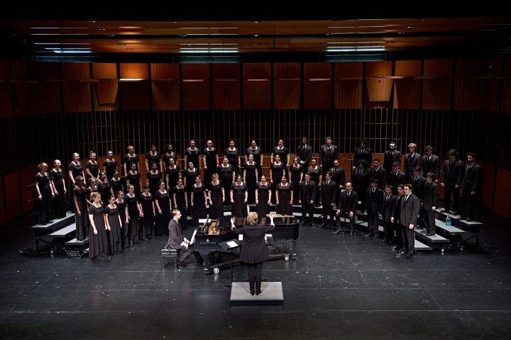 Chorale on stage with Dr. Buchanan and Accompanist