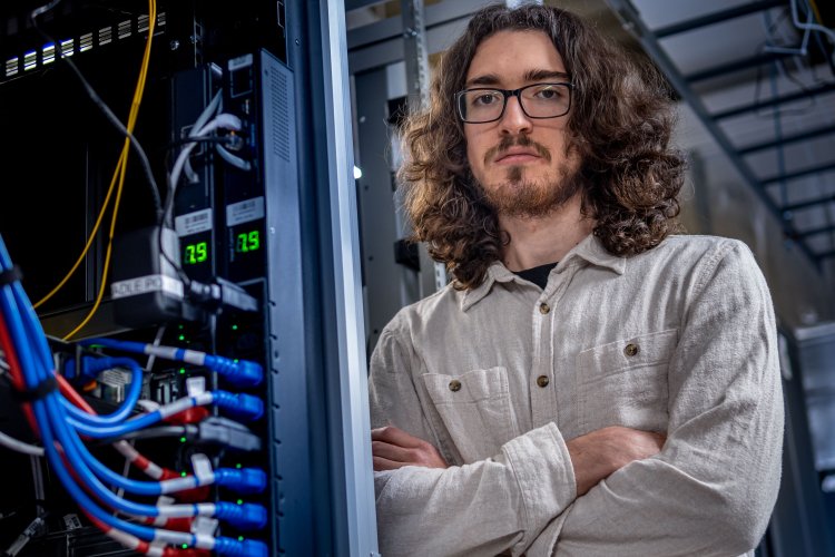 Montclair undergraduate student and Goldwater Scholarship winner, Joseph David Quinn-Vitabile at the Montclair University Data Center.