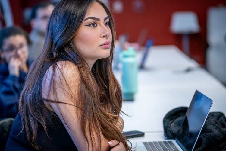 Student Sitting in Classroom