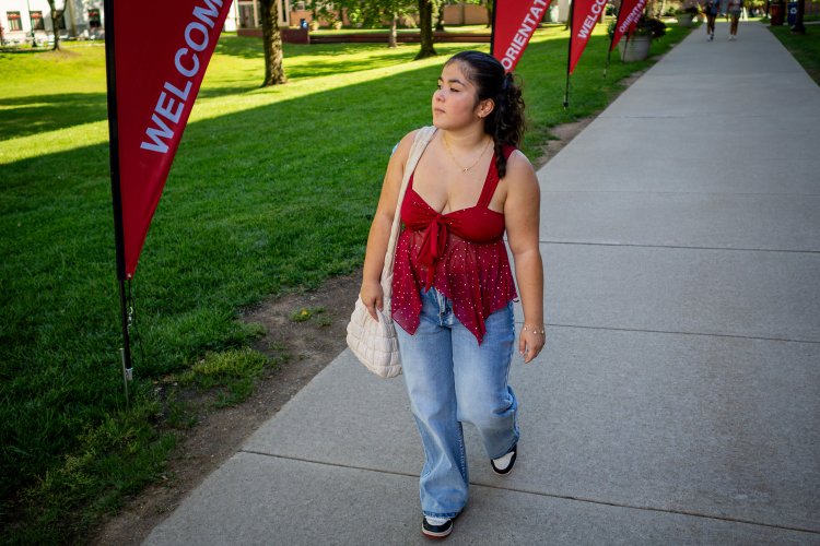 Ileana Zuniga walks along the Student Quad during Orientation Week.