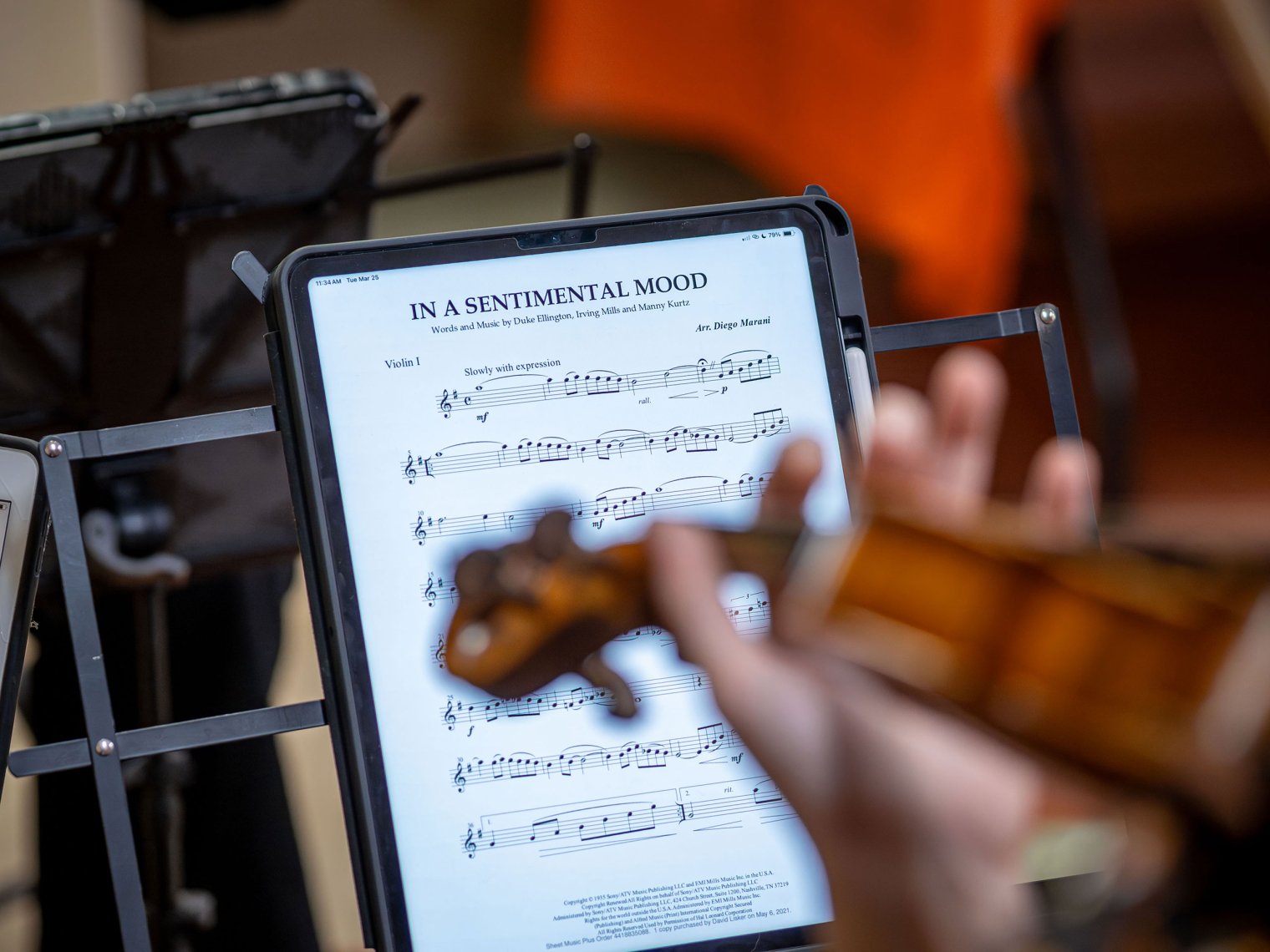 A closeup of sheet music on a digital tablet.