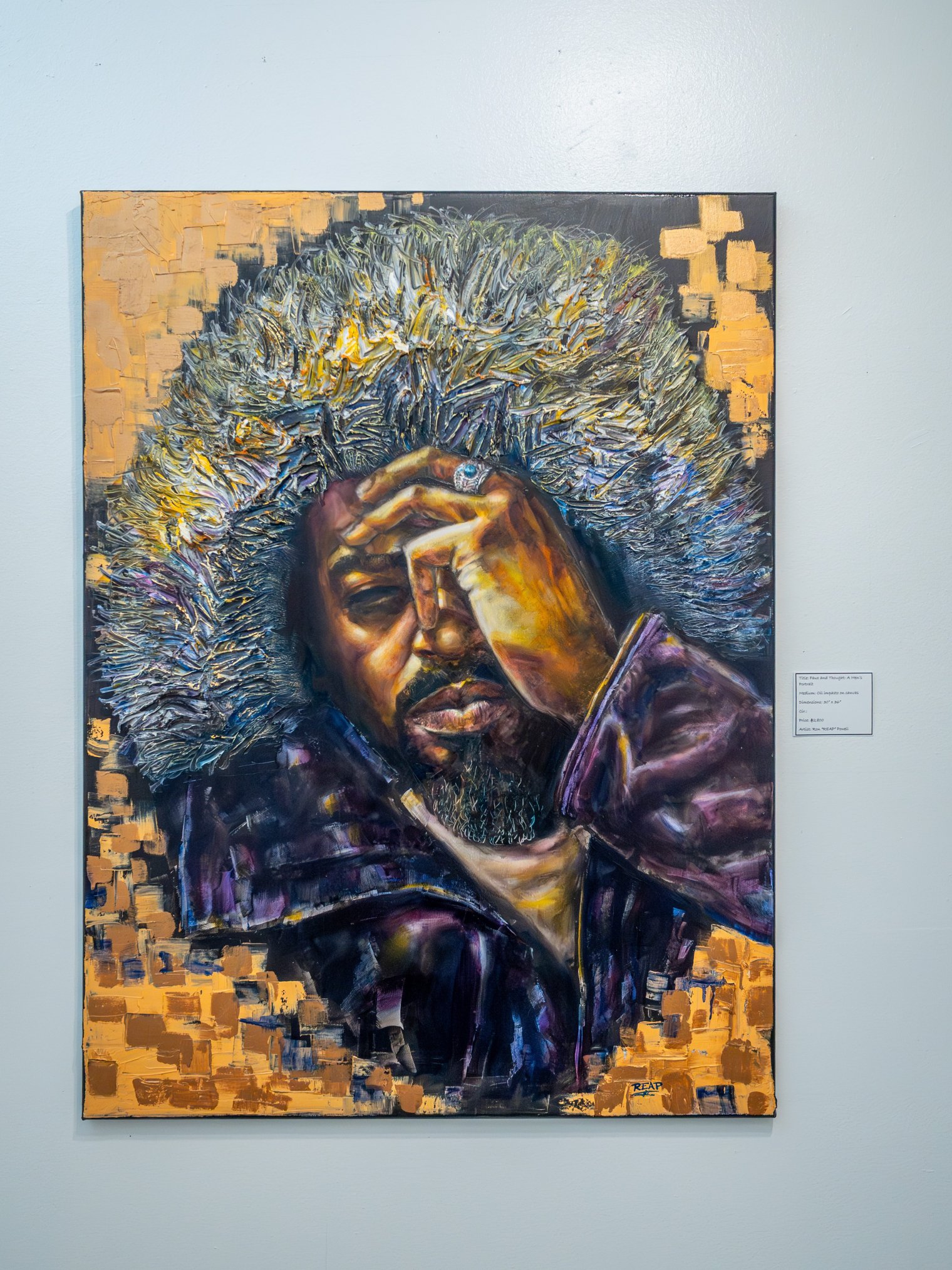 Painting of a man with his hand over his eye and fur hoodie over him. 