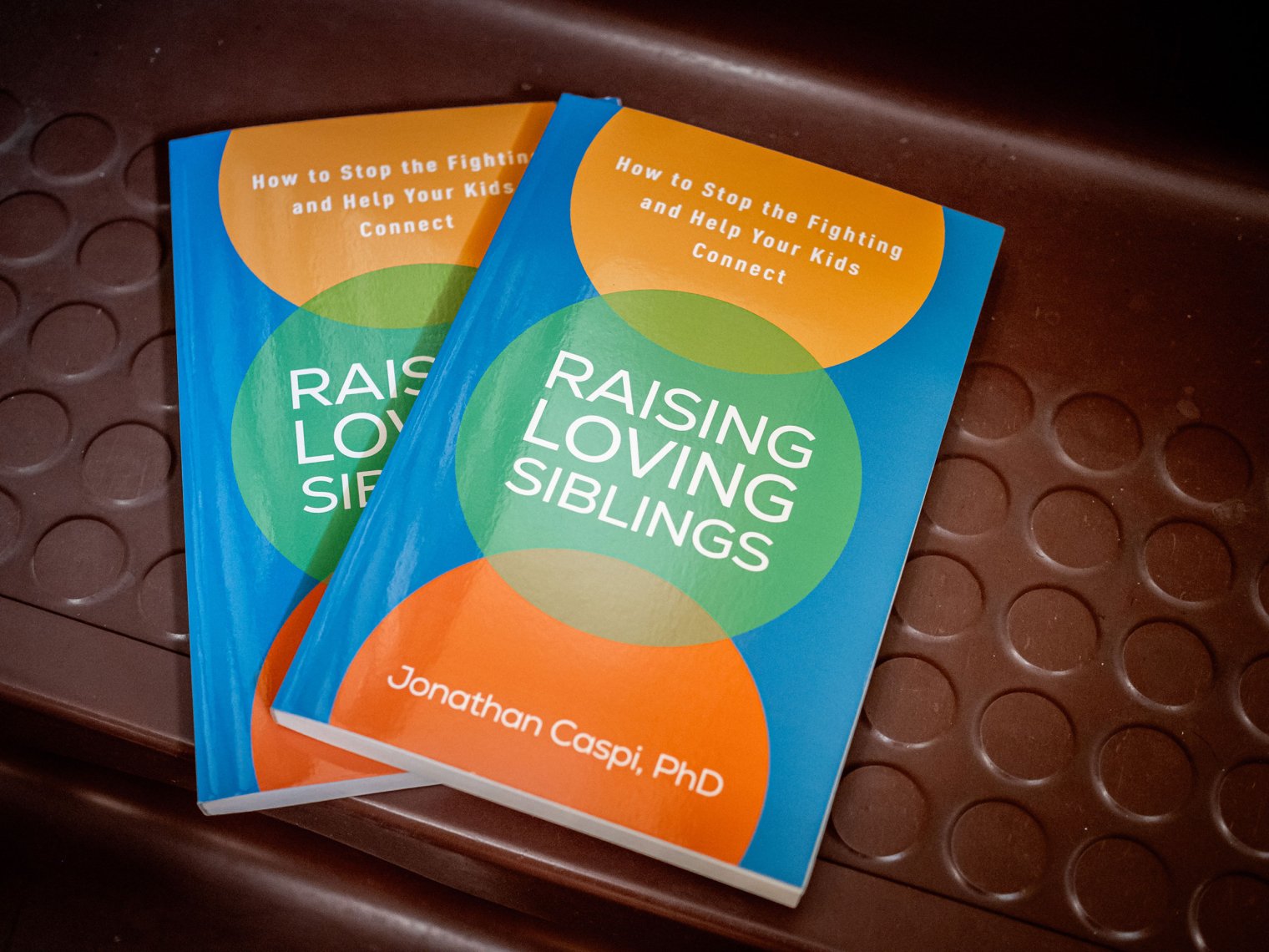 Jon Caspi’s book “Raising Loving Siblings: How to Stop the Fighting and Help Your Kids Connect.”