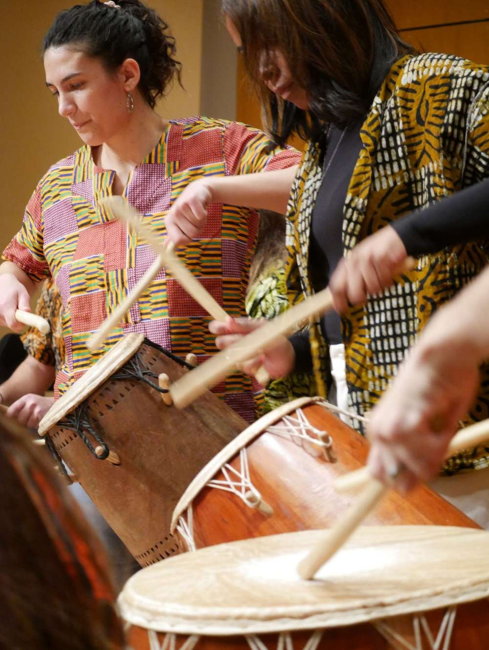 Students playing drums.