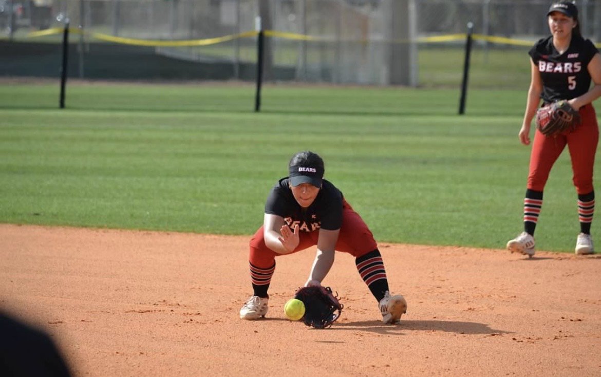 Woman playing softball.