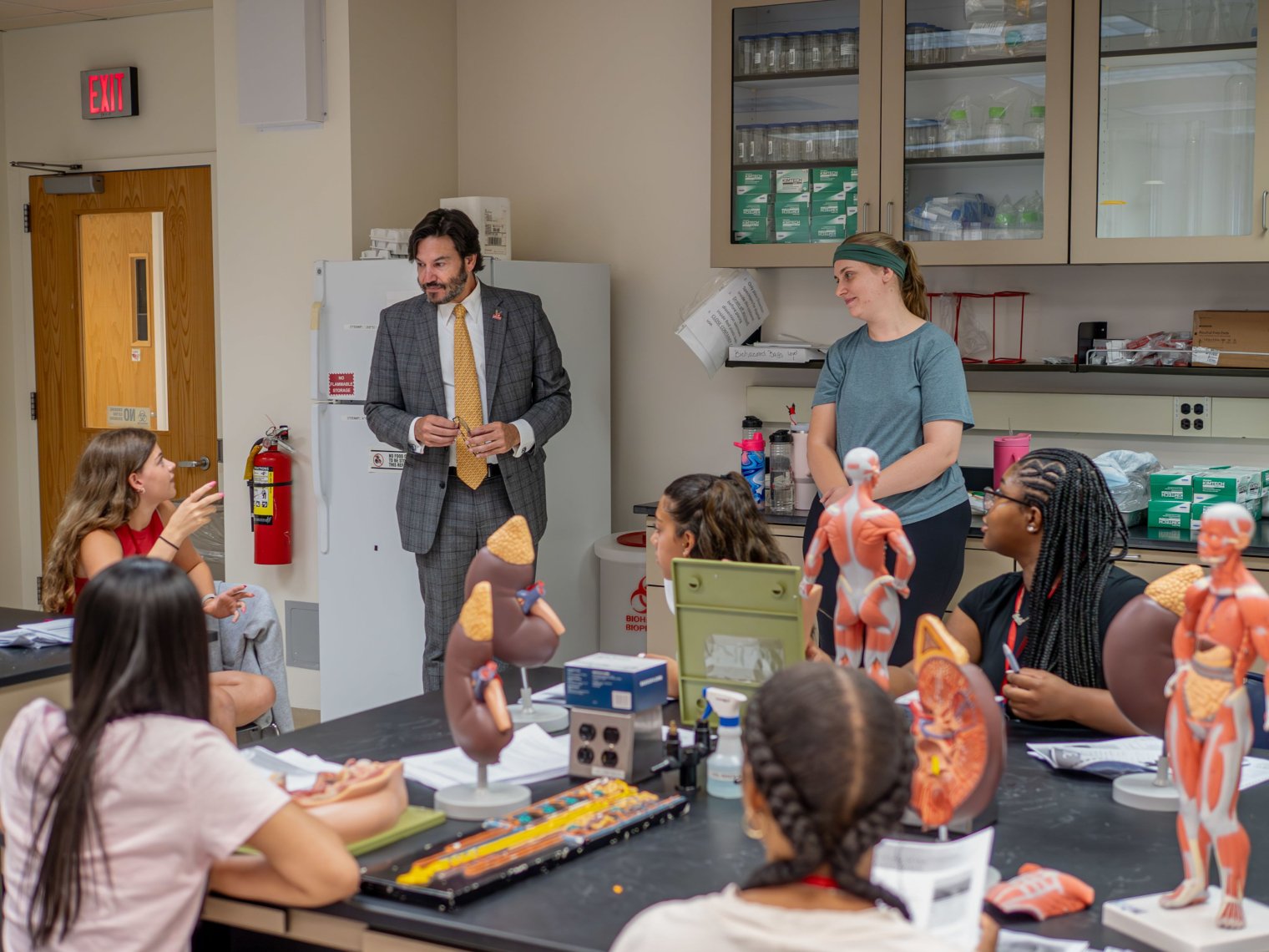 President Koppel takes questions from high school students in biology lab